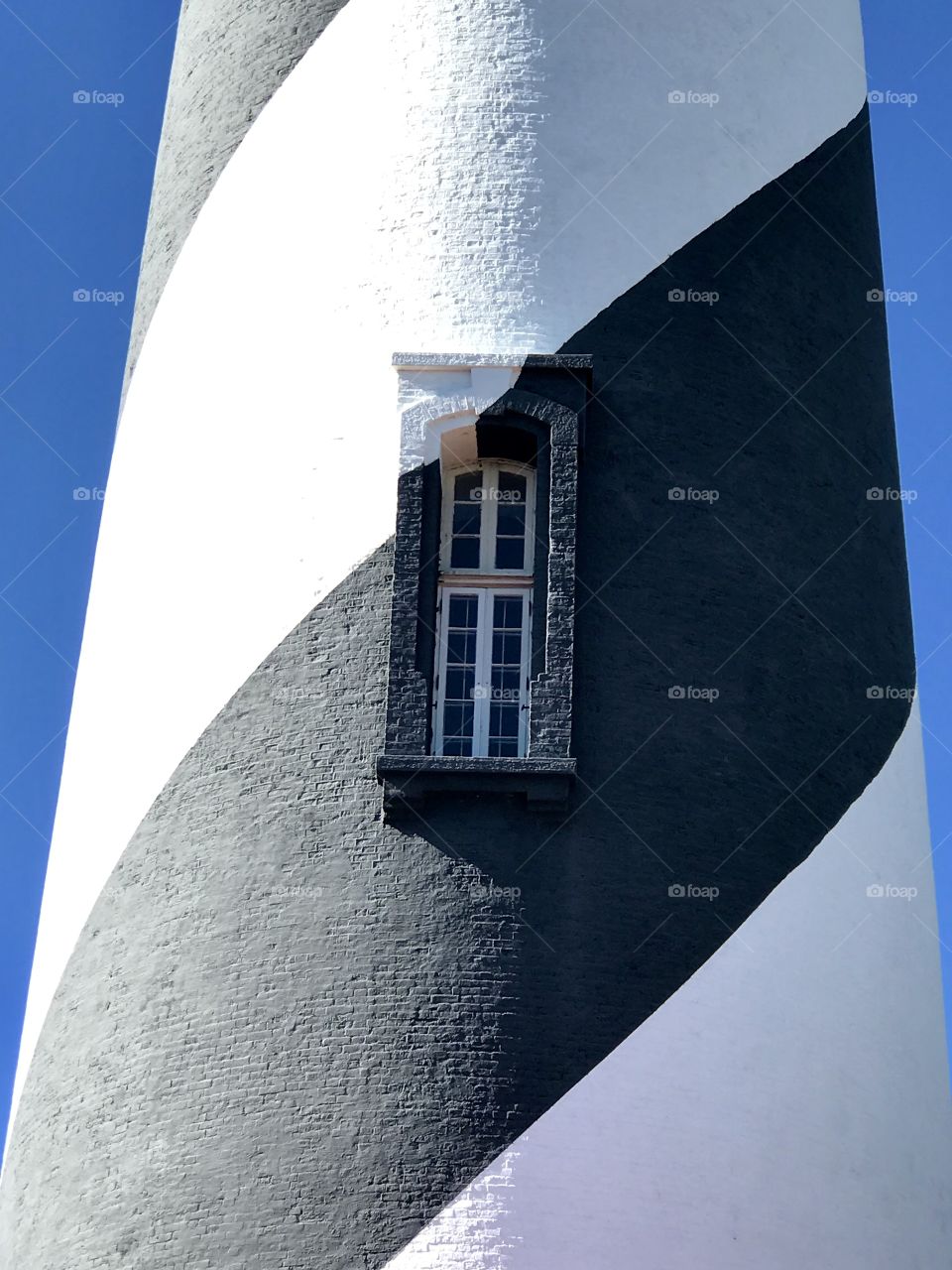 Black and white striped lighthouse window 