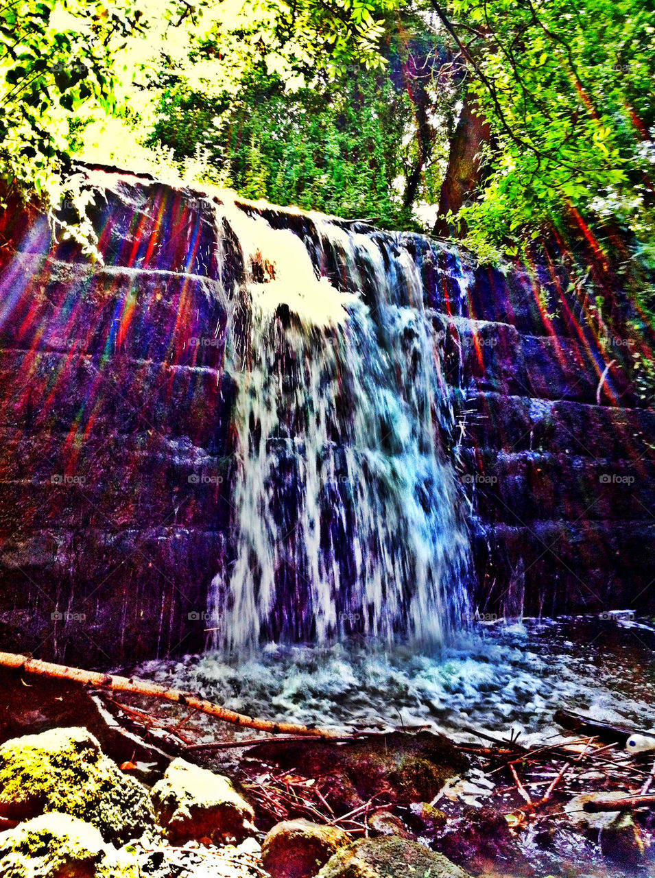 Beautiful waterfall with rainbows