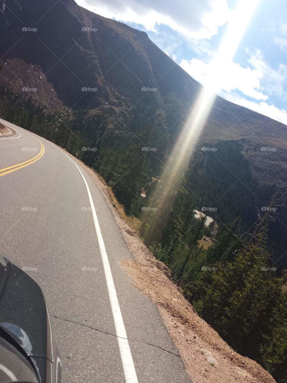 Journey up to Pikes Peak crepuscular rays
