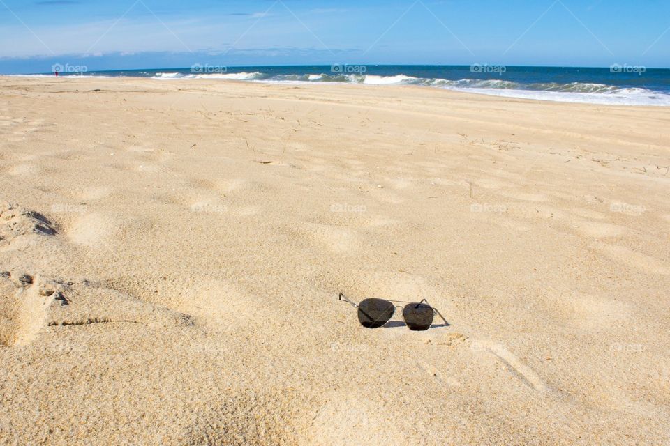 Oh what the eyes can see. Sunglasses on the beach at Cape Henlopen, DE. 