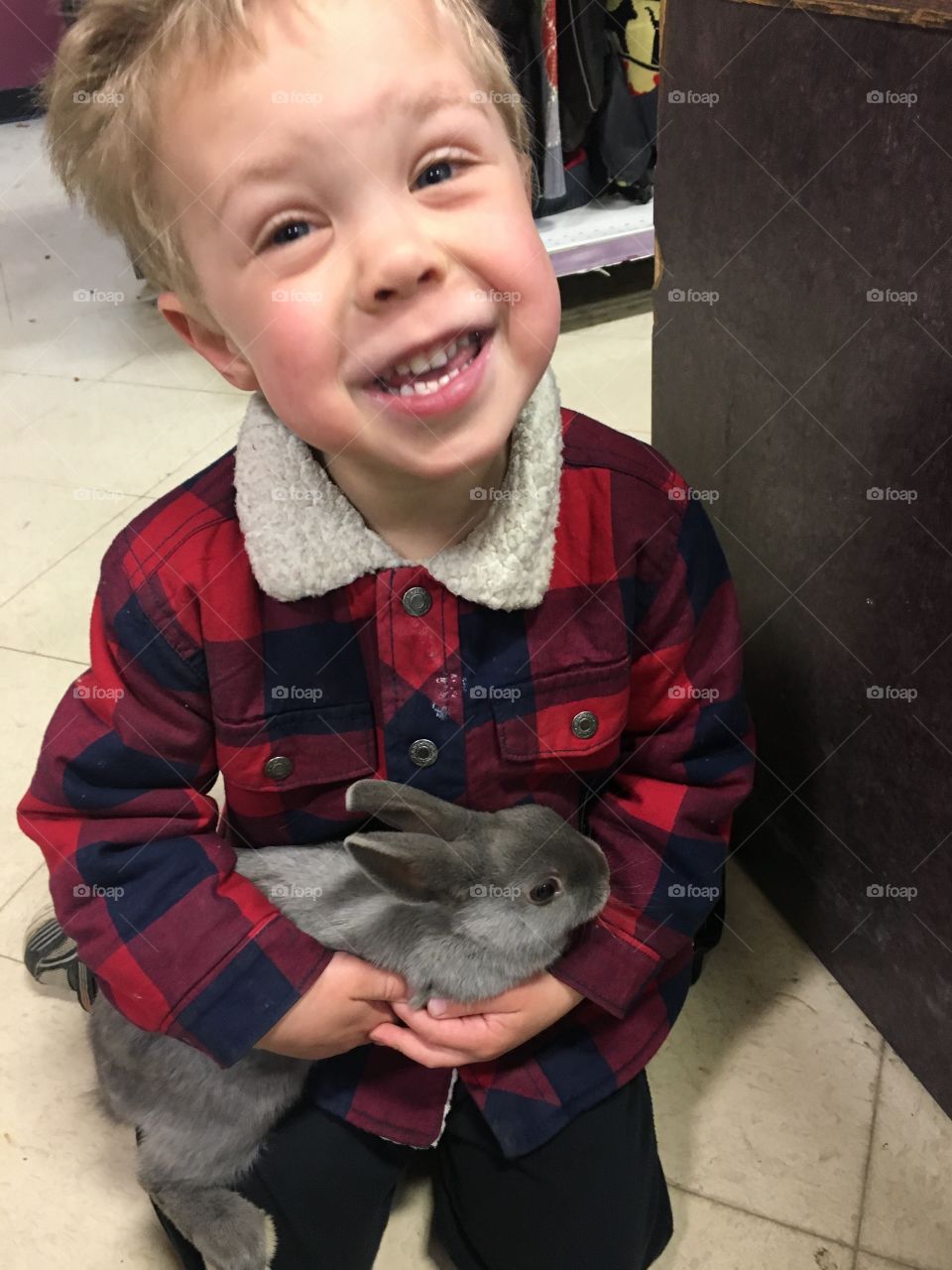 Smiley boy with a bunny 