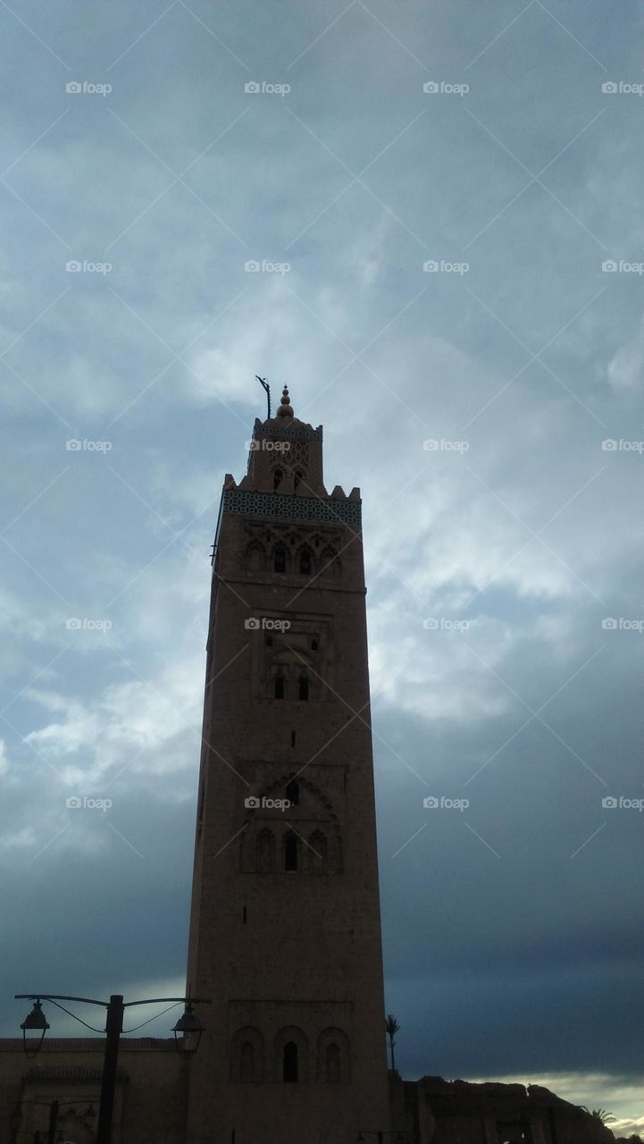 famous historical '' Kotoubia tower mosque '' in Marrakesh city in Morocco.