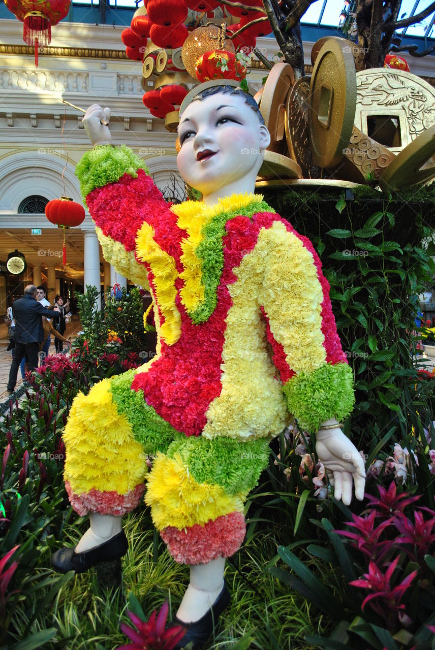 Chinese man made of flowers