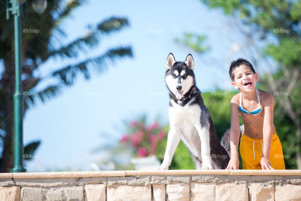 a boy with his dog