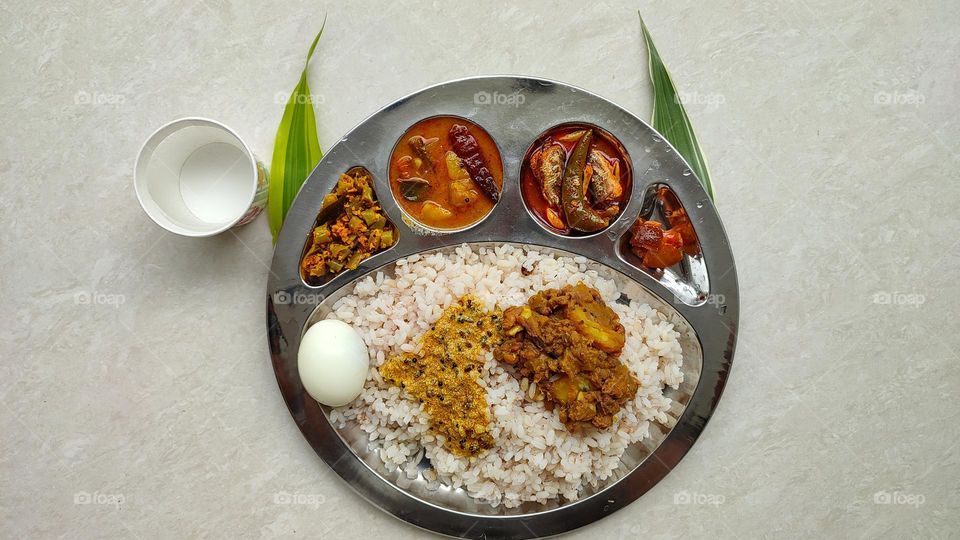 Rice Thali with veg and non-vegetarian