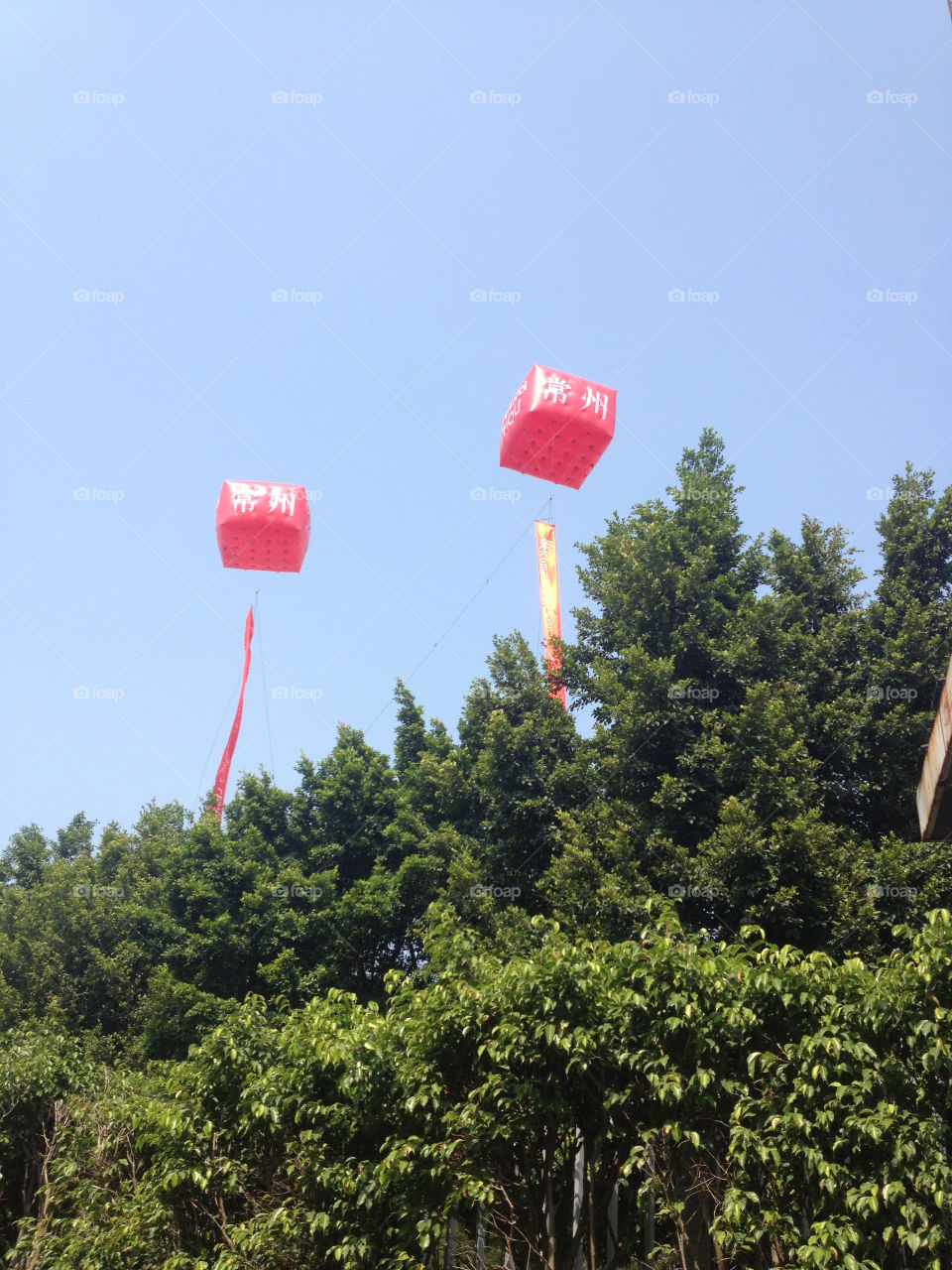 Flying red balloons on a exhibition