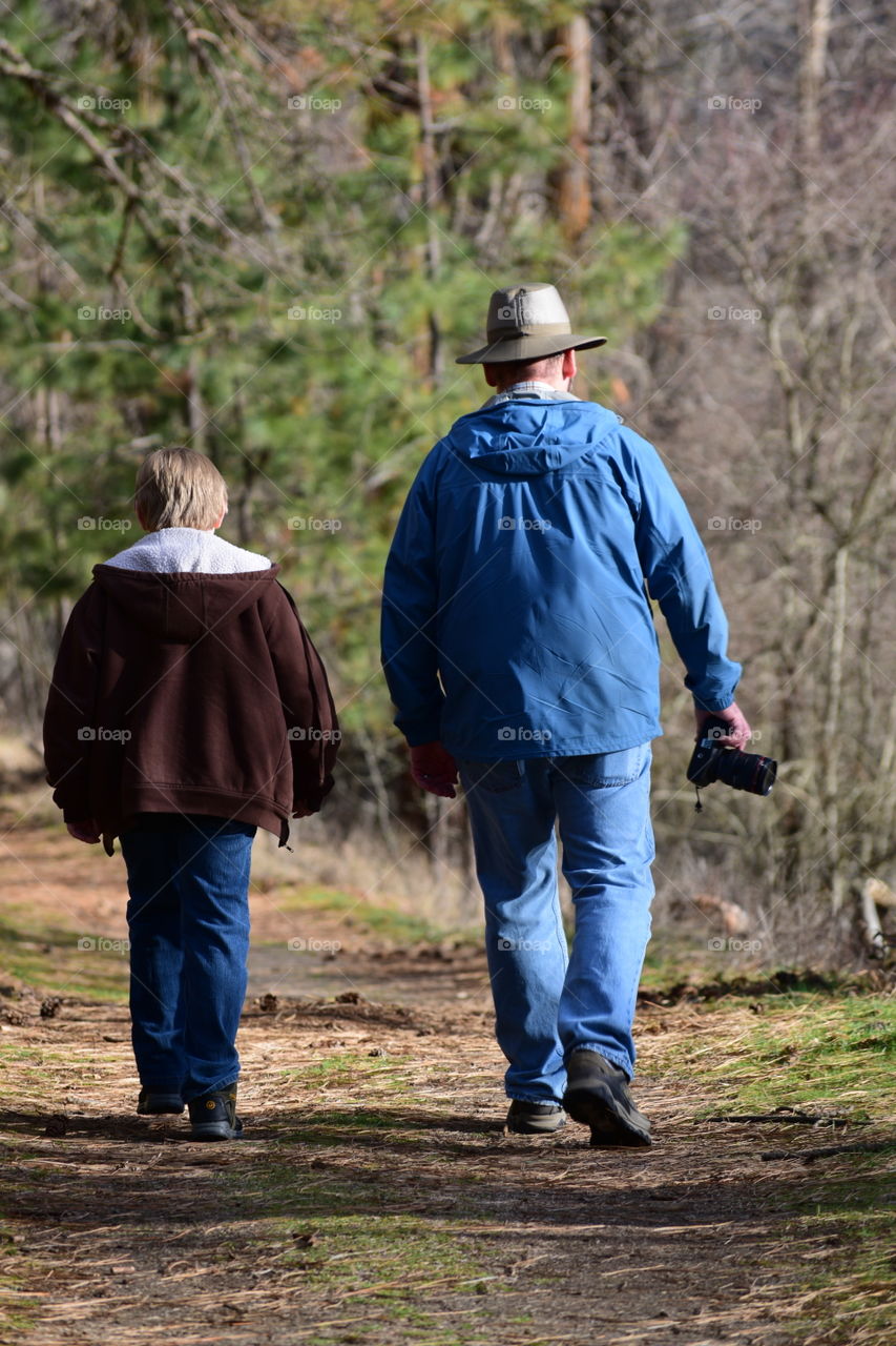 father & son in the forest