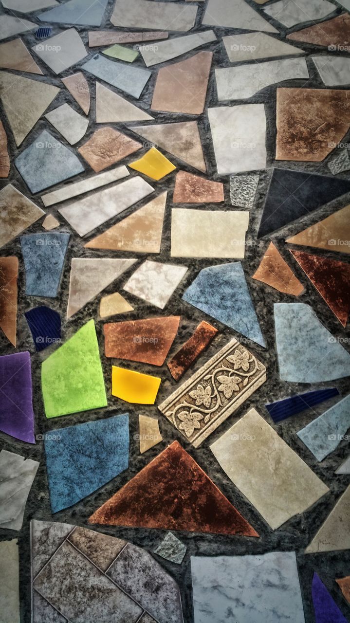 Recycled tiles make up this beautiful flooring at a stop we made on St Lucia..so I just couldn't resist taking a picture