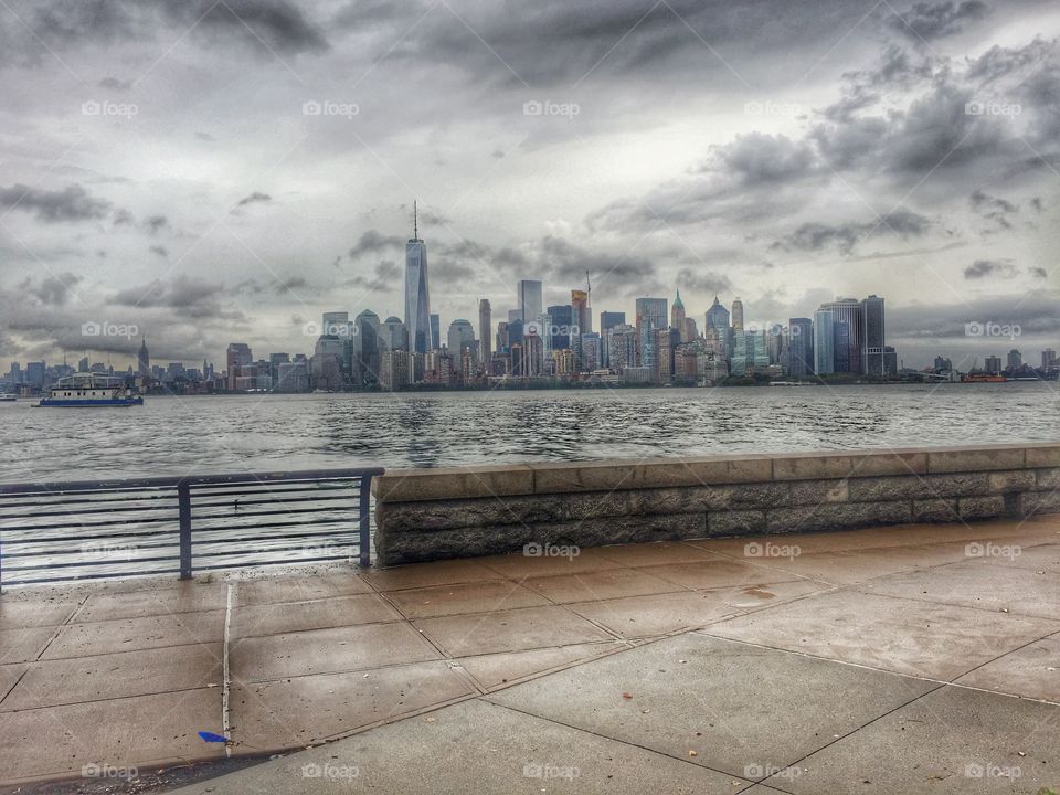 A grey day view of New York from Ellis Island.
