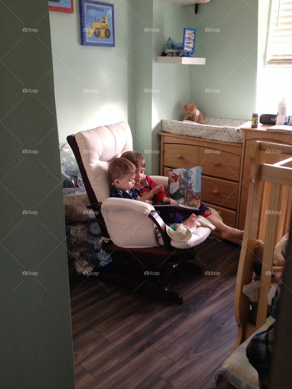 Brothers reading a story.