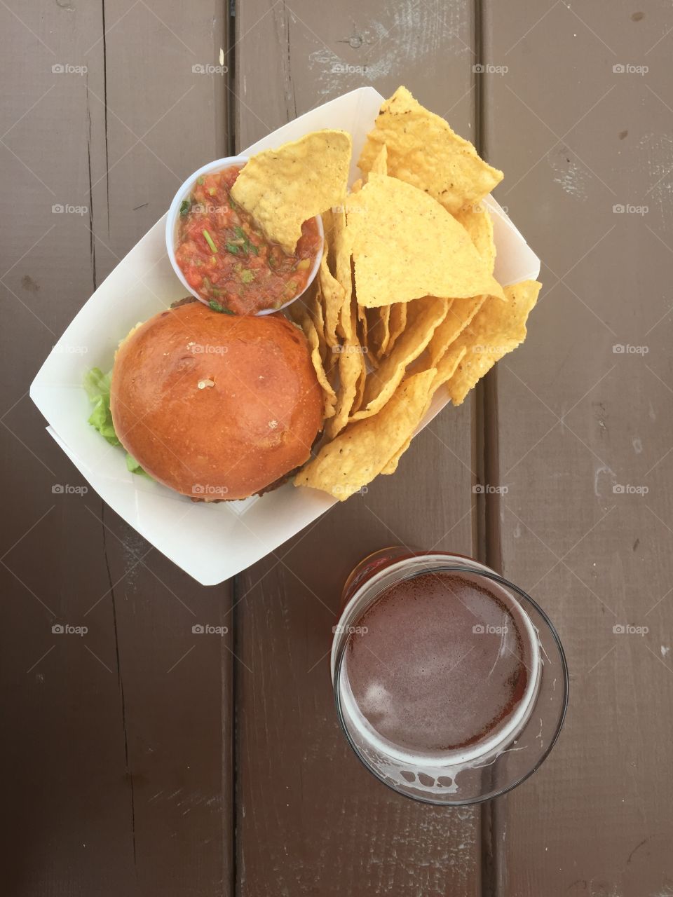 Fresh veg burger with tortilla chip and beer