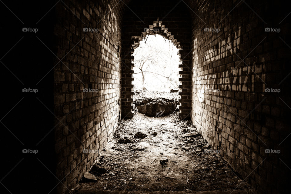 Sepia viev underground tunnel in old German factory of the synthetic gasoline