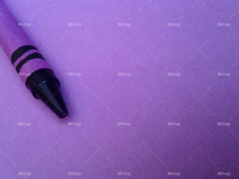 Crayon color against purple background
