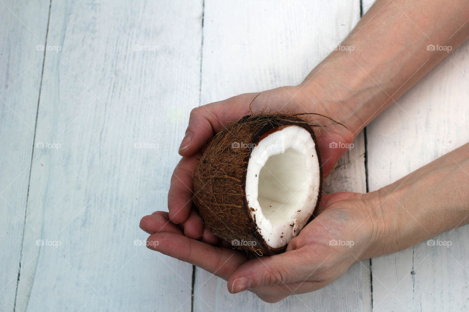 Coconut, fruit, food, hands, still life, abstraction, coconut in hands, cut coconut in hands, whole coconut, broken coconut