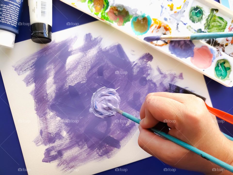 Mixing acrylic paints for crafts.