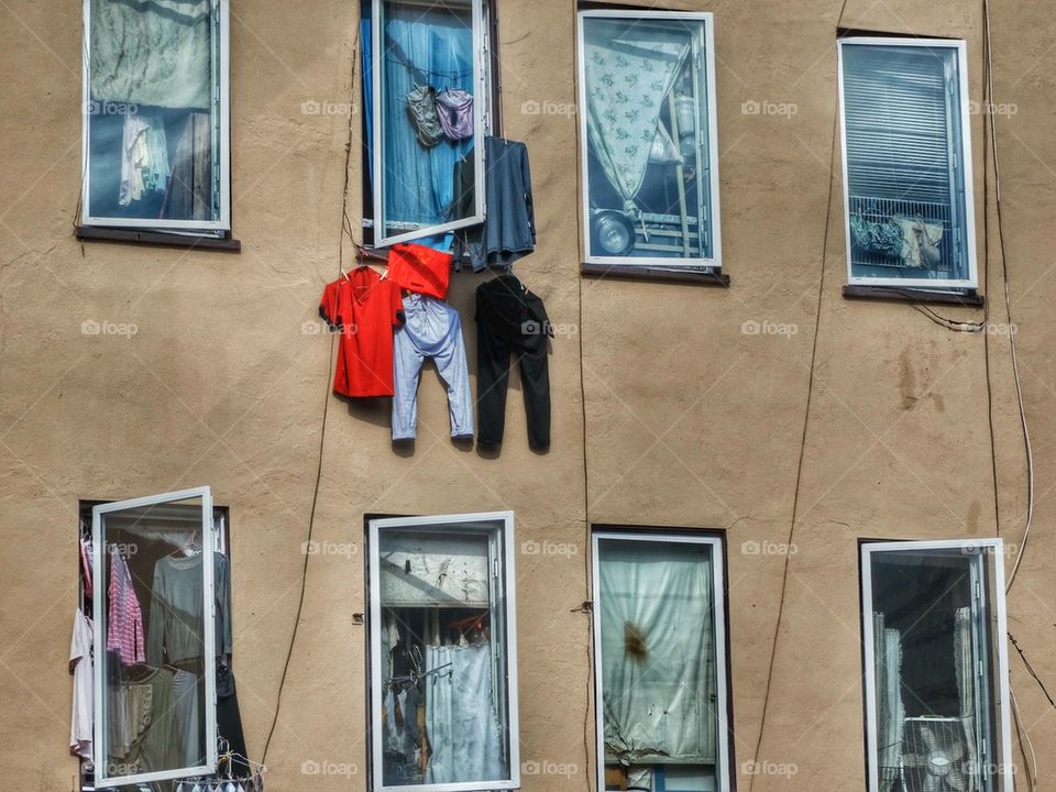 Laundry Hanging To Dry From A Window