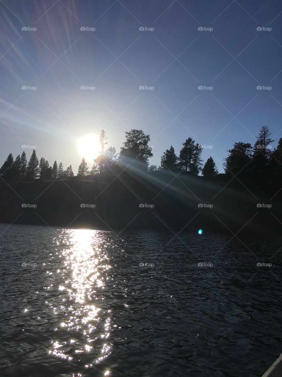 Sun setting on shimmering Williams Lake, WA
