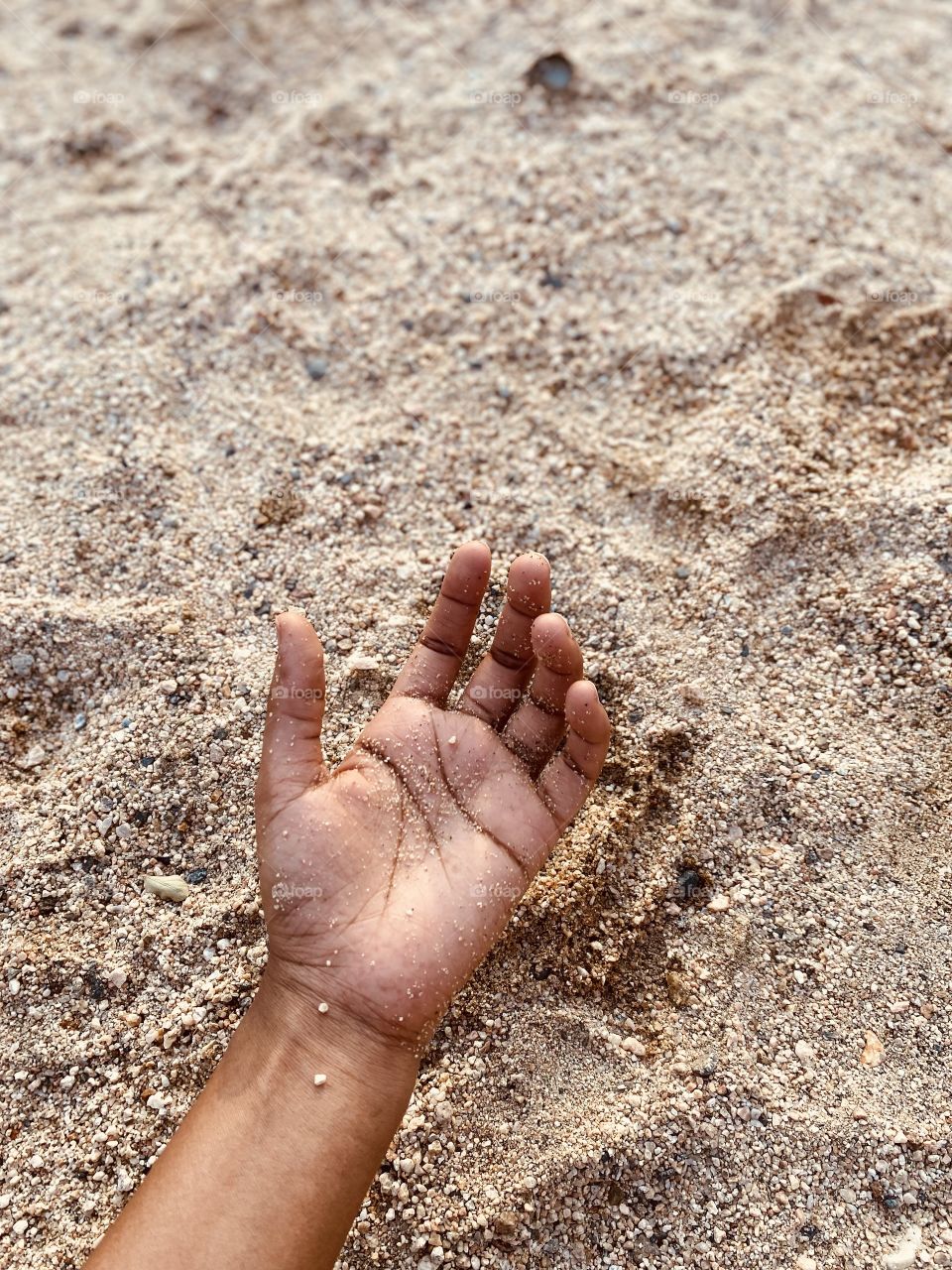 When we visited our village, my sister's first outing was playing with soil and water