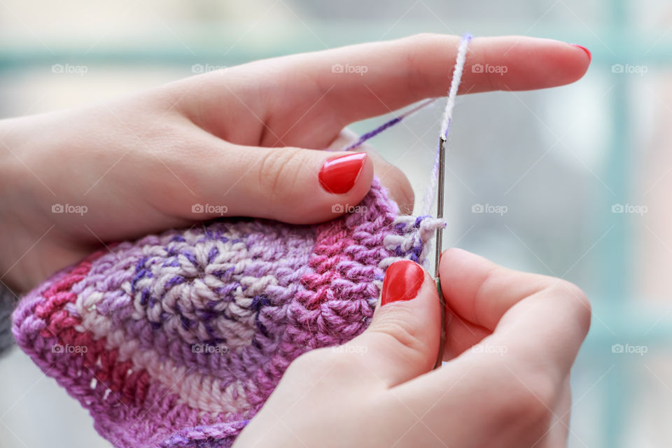 Woman hand knitting wool