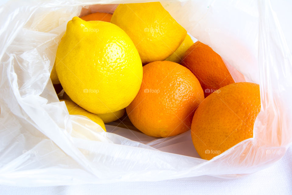 Oranges with lemons