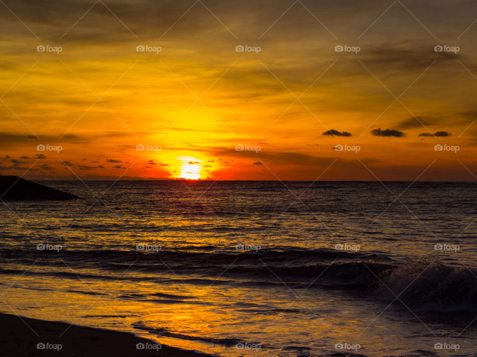amazing sunset on the shores of Kuta Beach Bali Indonesia