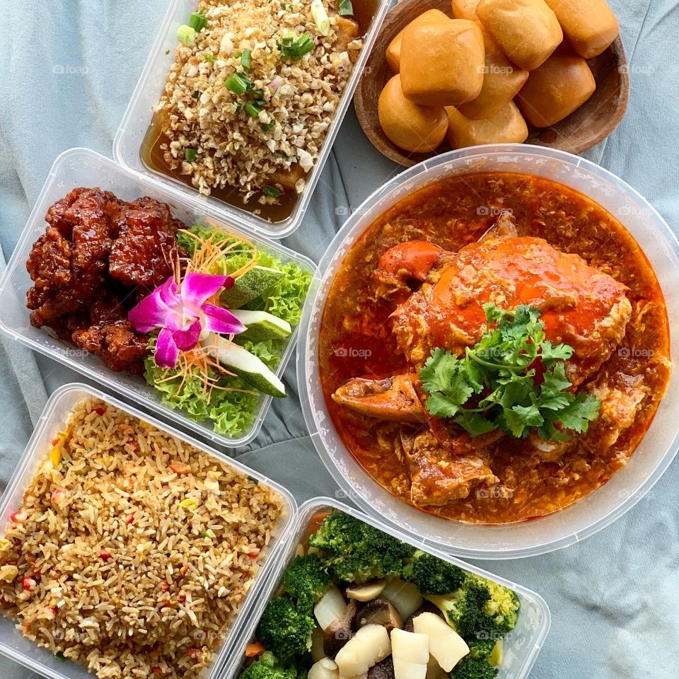 Asian local dishes in tze char style, Chilli crab, coffee pork ribs, caipo beancurd, broccoli with scallops and classic fried rice 