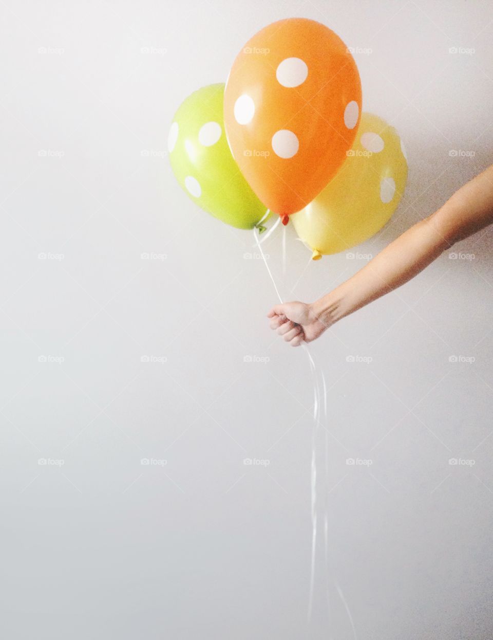 A person holding a balloon