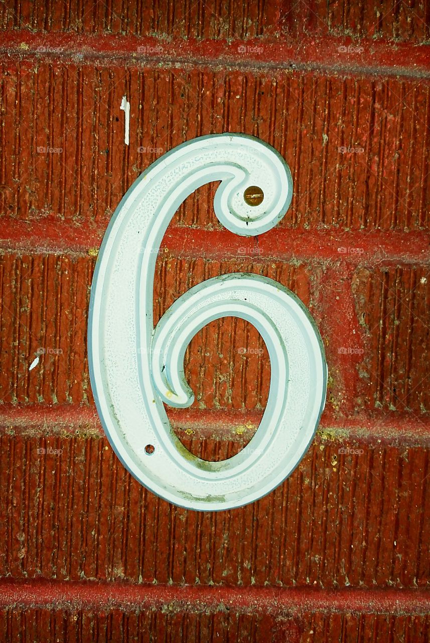 house number on brick exterior  number 6