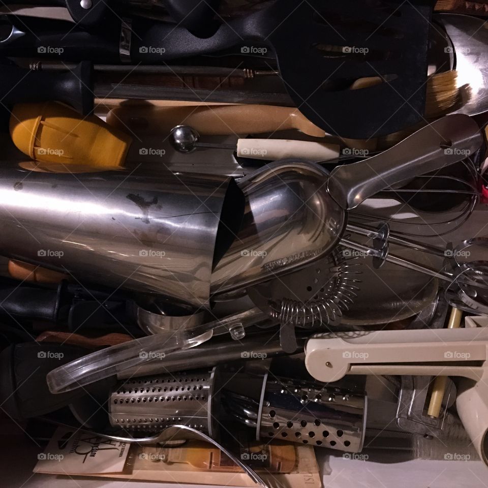 draw filled with a bit of everything  - cluttered space 