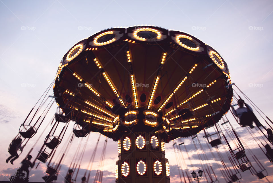 carousel and sunset