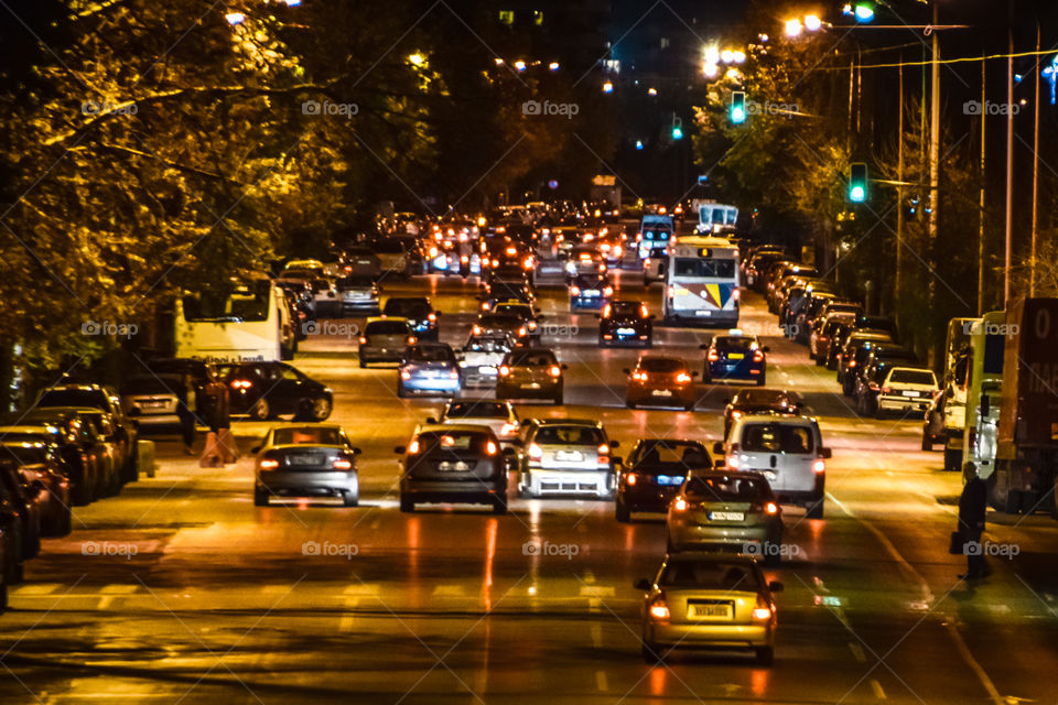 Cars In Traffic At City Night Road
