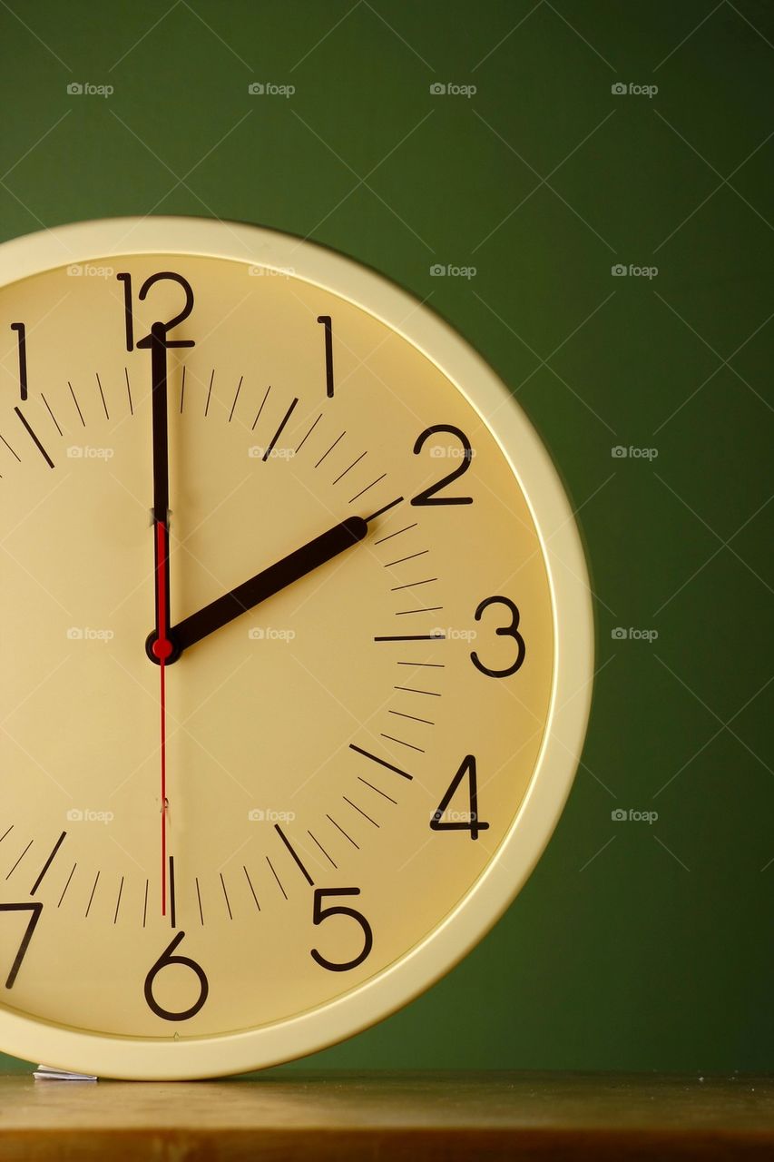 analog clock at two o'clock position