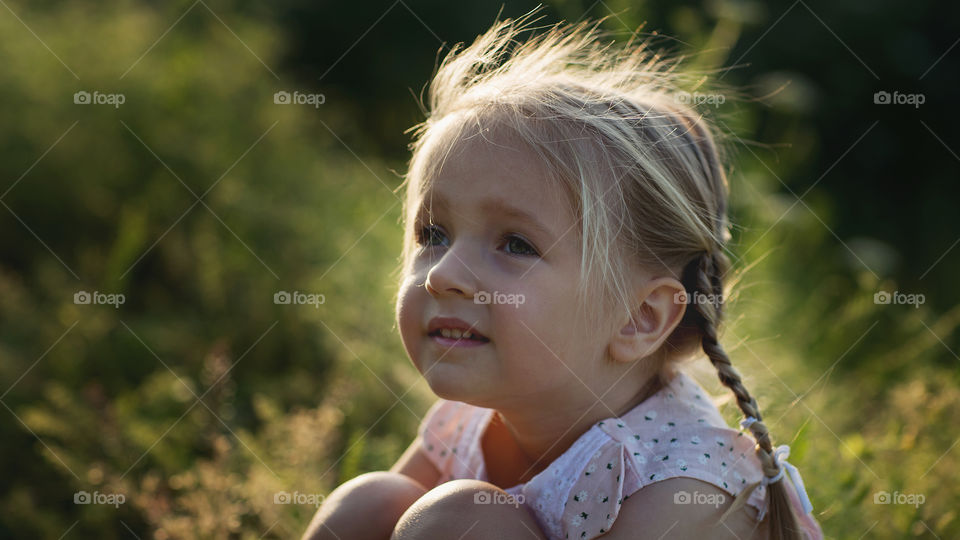 Portrait of cute little girl outdoor 