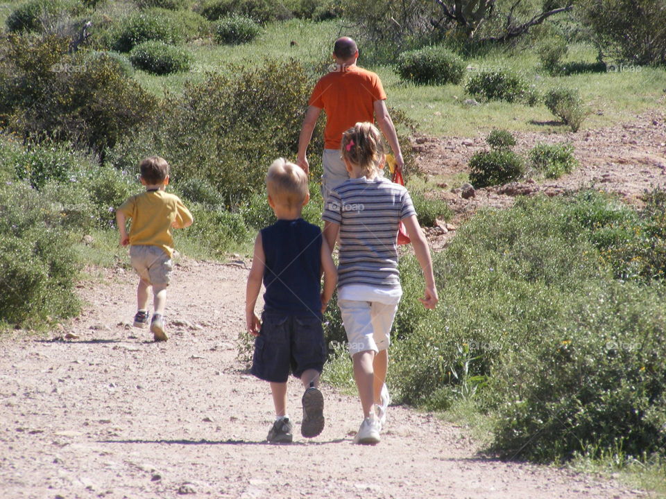 People walking on a trail.