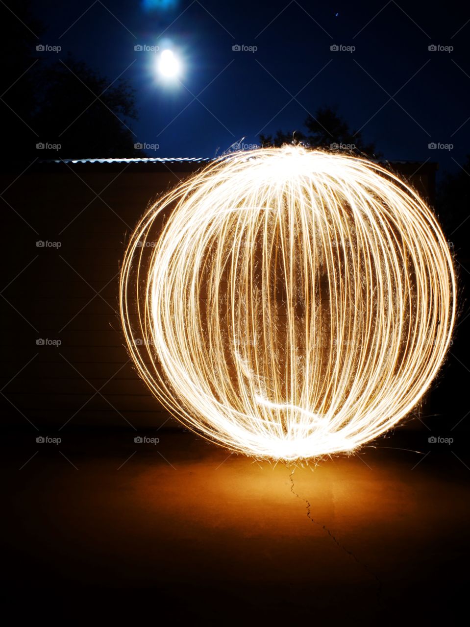 Sphere light trail at night