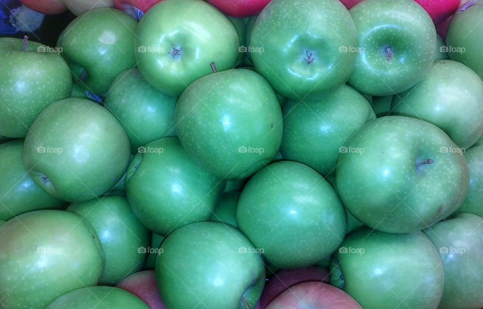 Green apples. beautiful crisp green apples ready to be eaten.