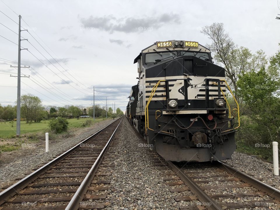 Train Waiting on Tracks 