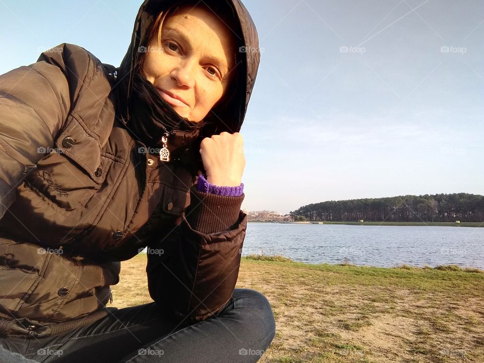 selfie girl on the nature lake shore