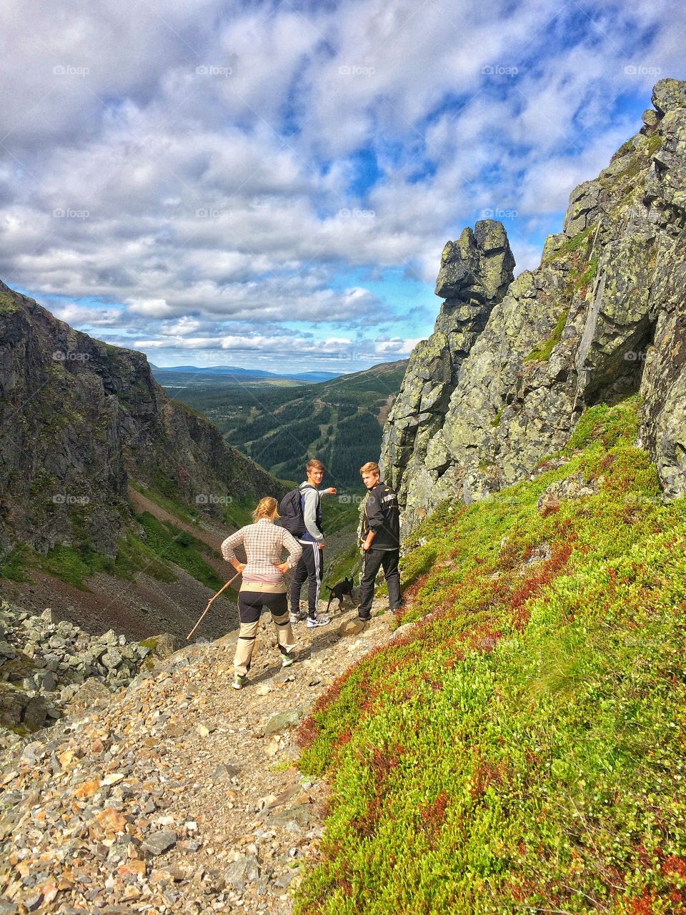 Group of hikers hiking in the mountain