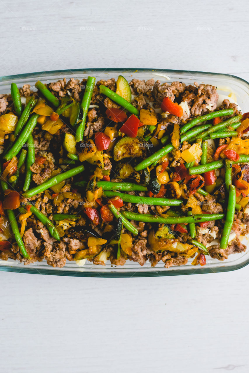 casserole with pasta, cheese, meat and fresh vegetables