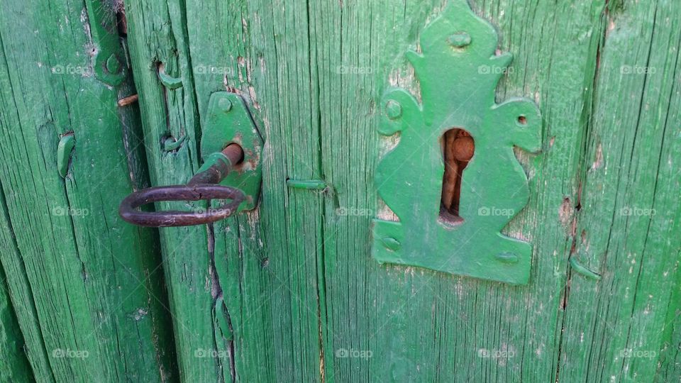 Old green doors
old keys and lockers