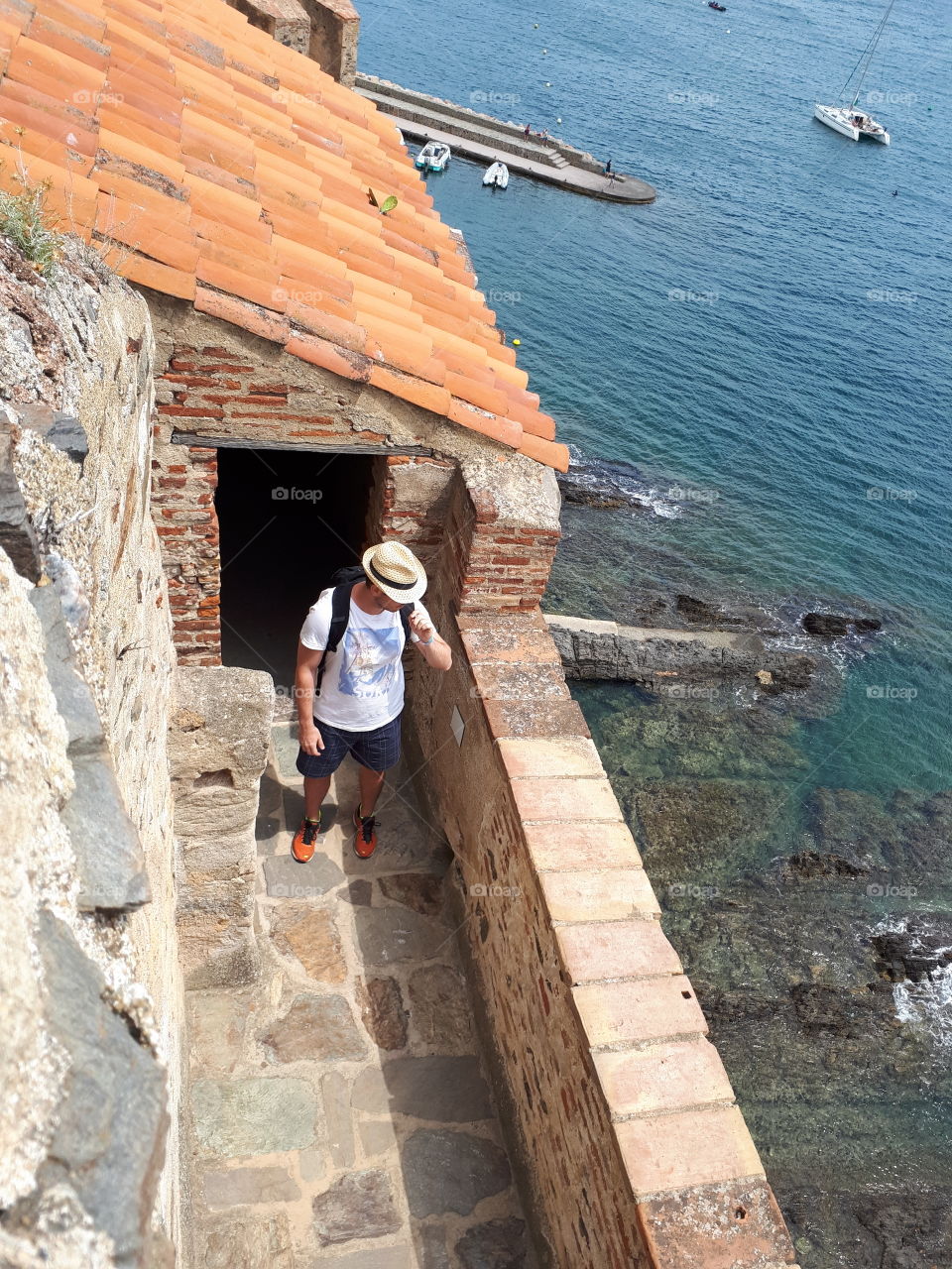 Man at the balcony of old castle