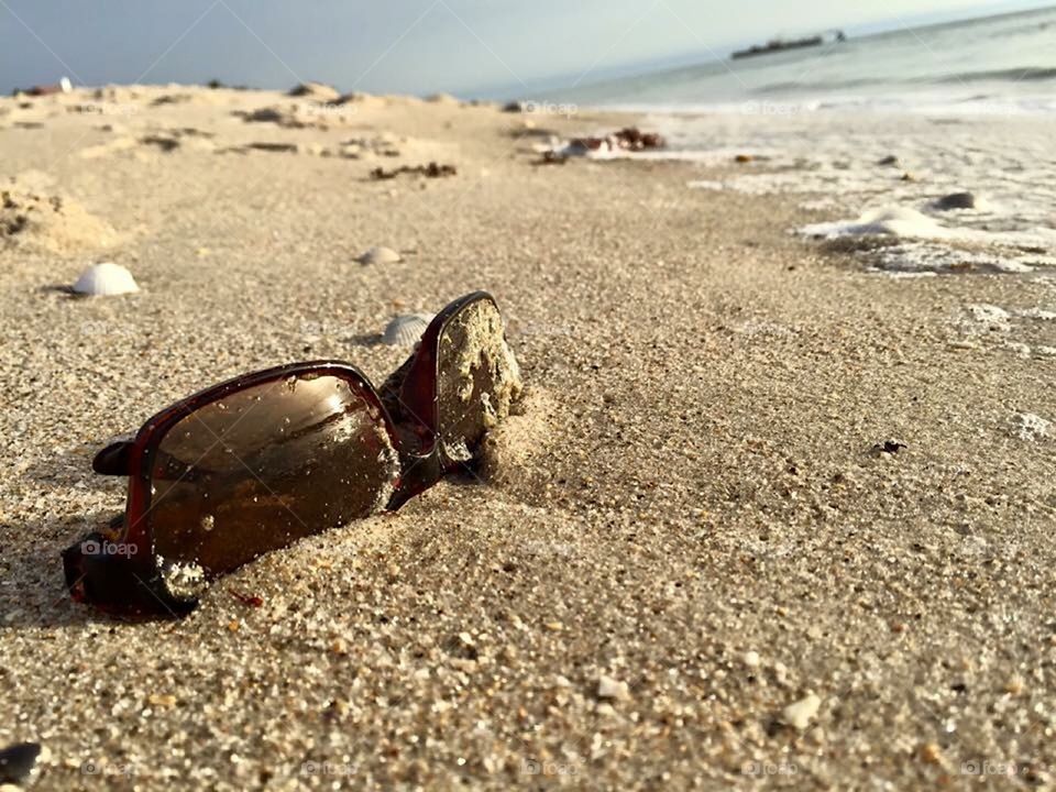Beach Find! Looking for sunglasses on the beach. Sandy lenses. 
