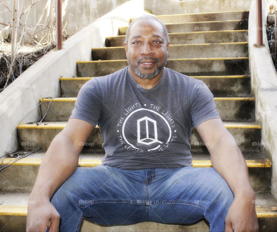 enjoying the day after a rainy weeknd sitting on the stairs.