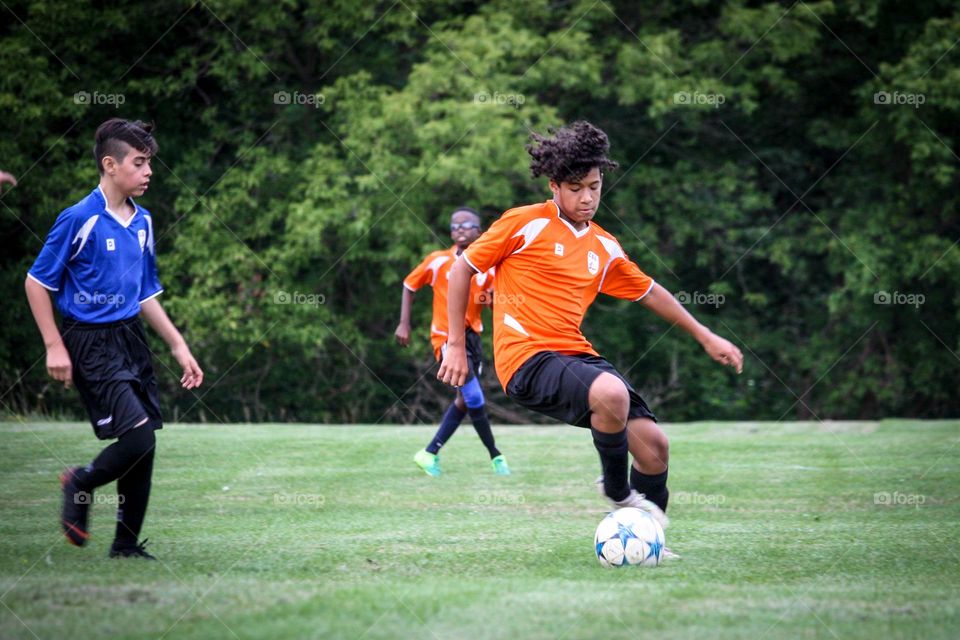 Controlling soccer ball