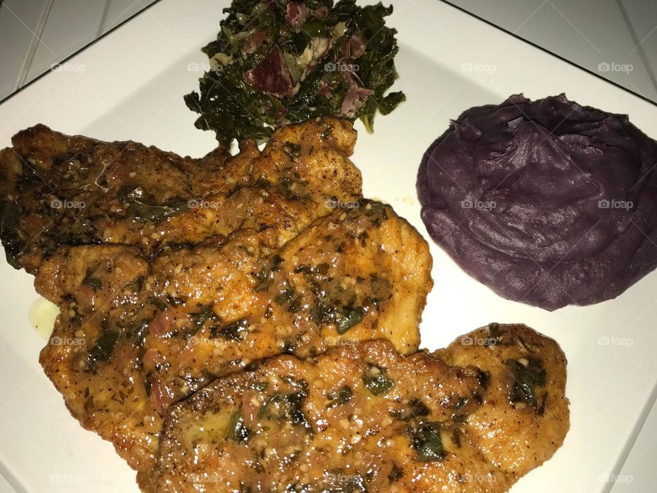 Sautéed Lemon Pepper Pork Steaks w/Okinawa Sweet Purple Mashed Potatoes and Kale Caesar Salad