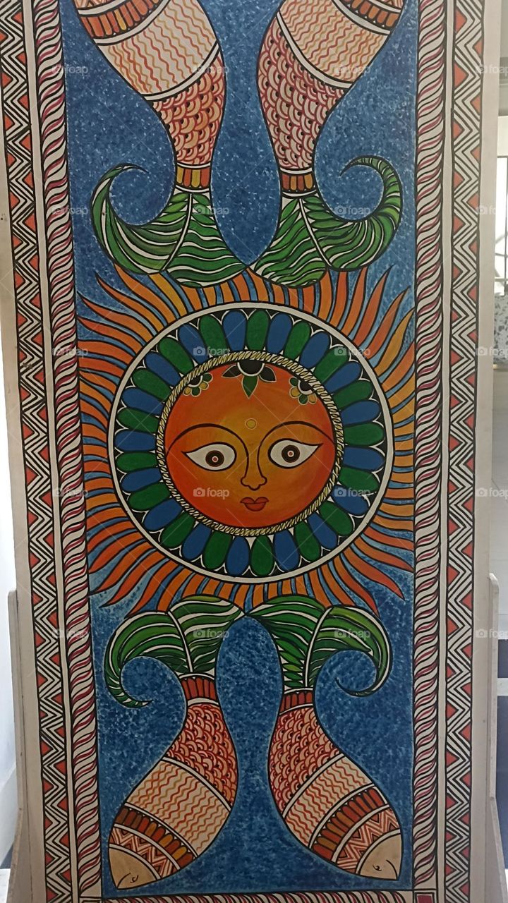 a beautiful madhubani art piece in a red green blue oracle with black outline that makes it more beautiful  work.