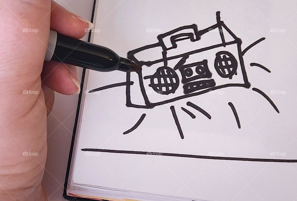 drawing of a boombox because music and art ignite the passion of the soul, unite us, and give us a voice