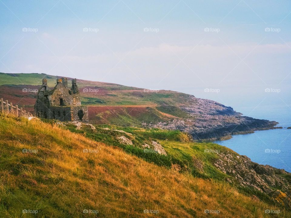 Vibrant Autumn grass and a castle
