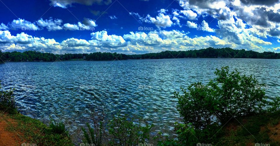 Scenic view of lake and clouds